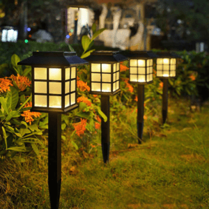 Weather-resistant outdoor lights illuminating a garden path